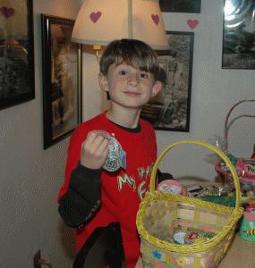 Alex going through his Easter treats after collecting them on Easter morning 2006.