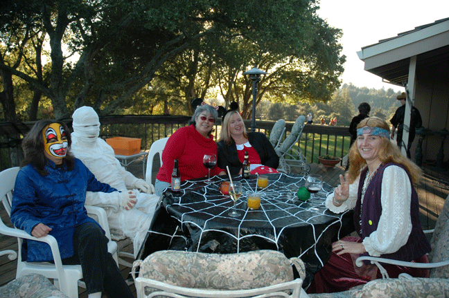 A group of Happy Valley friends at a 2004 Halloween costume party. Marty was the mummy, Susan a bug, Christine Minnie, and Judy a hippy.