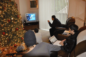 On some levels, not a whole lot changed after I moved out. Here's Christmas in teh condo, with Tom strumming on his guitar, Nick coding, and Alban and Alex playing a video game. Life goes on! 