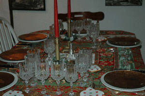 Part of our Christmas decorating, probably our favorite annual chore, was setting the table with our best silverware and crystal glasses, shown here in 2005.