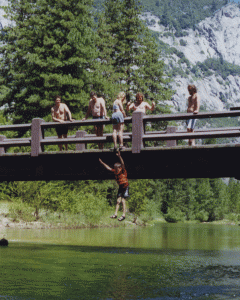 Nick has always been an adventurer. Here, in Yosemite, during our 1998 summer vacation he jumped into the Merced river. Cold! Tom and his dad were in a raft floating around the bridge, and took the picture from the raft.