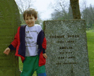 Tom next to the graves of his ancestors. The photo was taken in 1994. As the gravestones say, two of them were called Thomas. They’ve been gone a long time. I never even knew my grandfathers. Perhaps as a result, I occasionally follow up on other ancestors. The London cemetery that the graves are in had been renamed years ago and “renovated” recently, but somehow these graves survived. Not even knowing if the graves were there, or where they were if they were, we bumped right into them just strolling around.