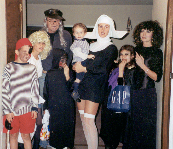 Almost the entire household, including our au pair Amélie, in 1999. Tom is the pirate, Nick the blond, Alban the grim reaper, I'm an old guy with bad teeth (it was a costume!), Alex in Amélie's arms, Daphné a witch with a full size bag for treats and Marie-Hélène in one of her fantastic creations.