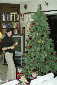 Again that moment of decorating the tree, this time in 2001 with Alex sharing in the results.