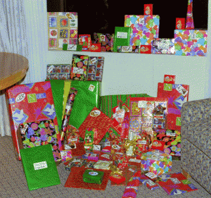 Presents draped around our room at the Disneyland Hotel, 1998. We worked at making Christmas work!