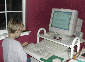 Charlie on the family computer in the office in 2003. He could actually be doing schoolwork here.