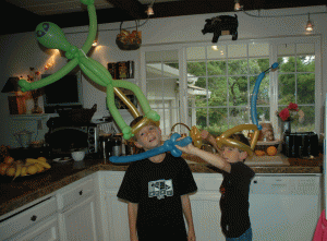 One of Santa Cruz's downtown characters made the boys these balloon sculptures.