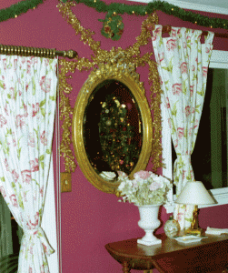 The parents are as much fans of Christmas decor as of Christmas presents. This detail from 2002 shows the tree reflected in the mirror on the living room wall. Marie-Hélène picked the color for the wall, which I loved.