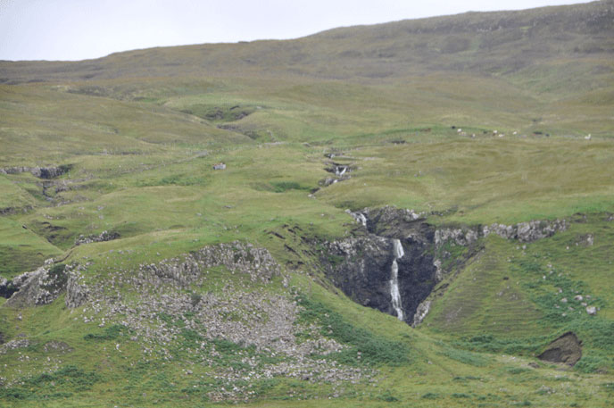 A stream tumbling down a Skye hillside. The Isle of Skye is just off the northwest coast of Scotland.